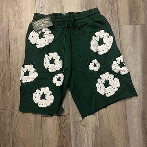 GREEN DENIM TEARS SHORTS